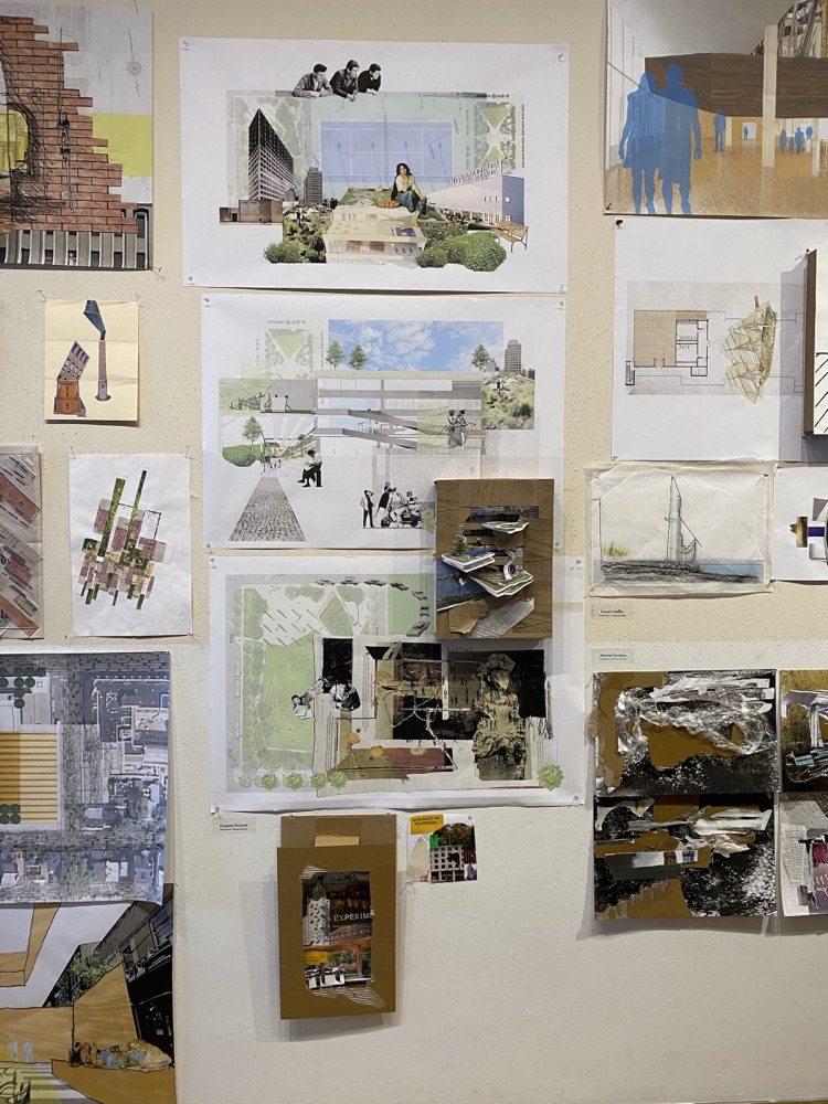 A studio wall pinned with architectural collages and study models