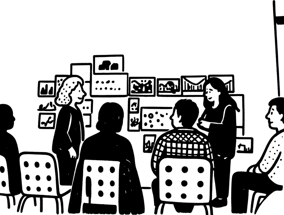 Line drawing of a design review: people seated before a wall of pinned-up drawings.