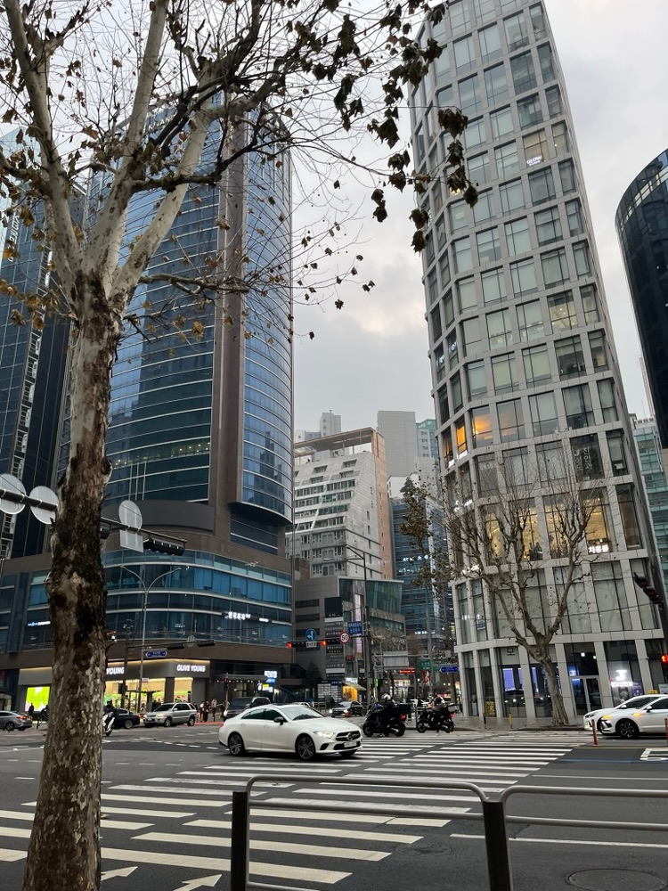 A dense intersection of towers and traffic, Seoul