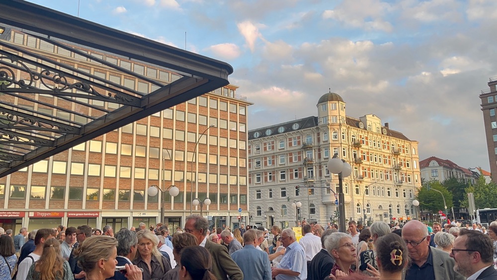 A crowd spilling out onto the square after a concert, Hamburg